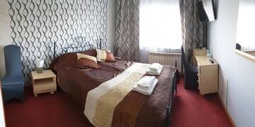 Фото номера Семейный номер Отель Hotel Bursztynowy г. Józefów na Wisłą 3