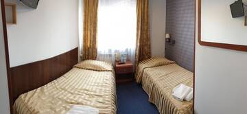 Фото номера Семейный номер Отель Hotel Bursztynowy г. Józefów na Wisłą 3